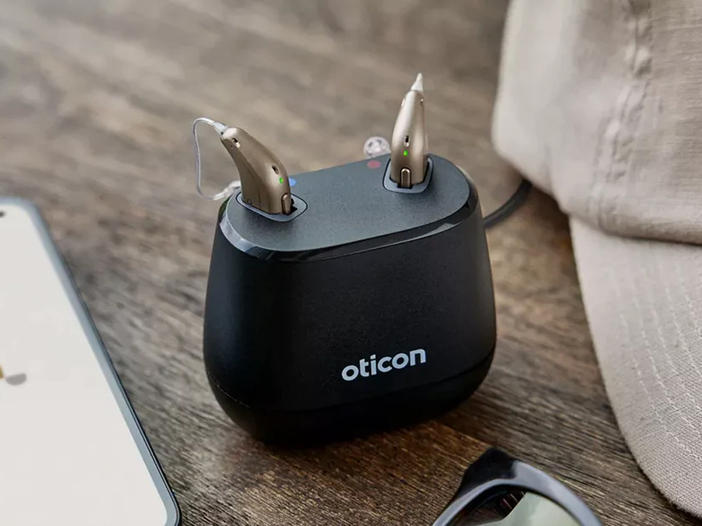 Rechargeable hearing aids on an overnight charger, an alternative to disposable batteries at Anne Arundel Audiology in Glen Burnie, MD