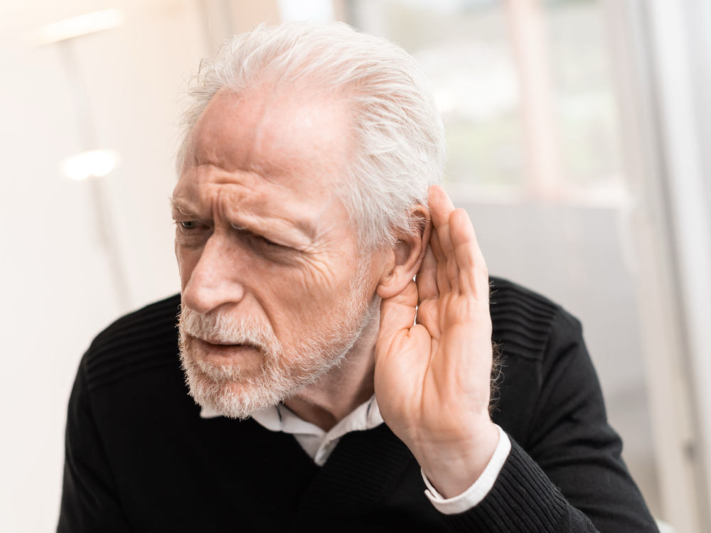 Patient learning about sensorineural, conductive, and mixed hearing loss at Anne Arundel Audiology in Glen Burnie, MD