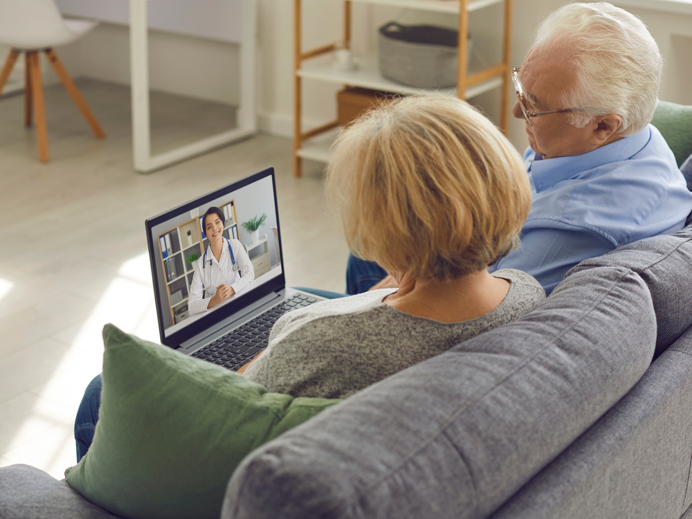 Patient attending a remote hearing care video appointment with Anne Arundel Audiology in Glen Burnie, MD